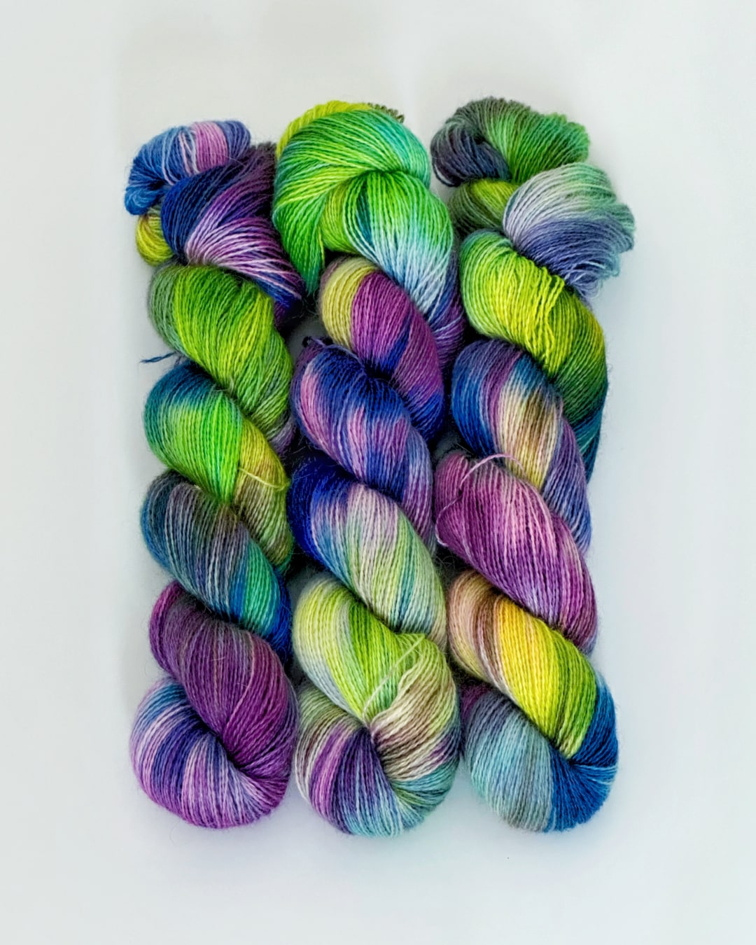 Cashgora hand dyed yarn colors Blue purple green lemon