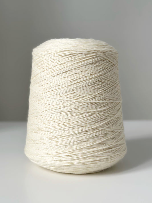 Merino wool, nylon. White.