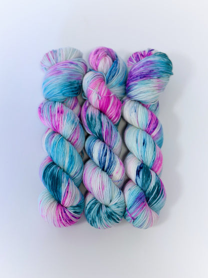 Merino superwash and nylon hand dyed yarn color Unicorn